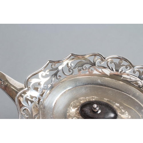 284 - A SILVER TEAPOT, maker Deakin & Deakin, Sheffield 1912, of lobed oval squat baluster form with shape... 