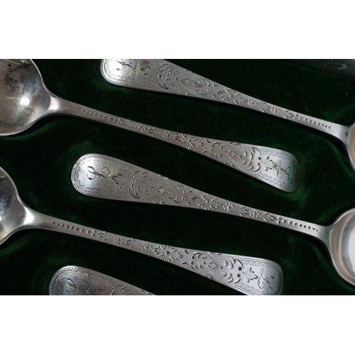 293 - A SET OF TWELVE LATE VICTORIAN SILVER TEASPOONS, maker Cooper Bros., Sheffield 1899, with bright cut... 