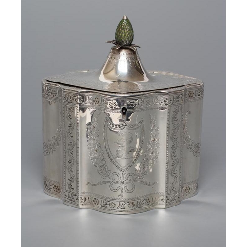 311 - A GEORGE III SILVER TEA CADDY, maker Henry Chawner, London 1788, of serpentine form, the flat hinged... 