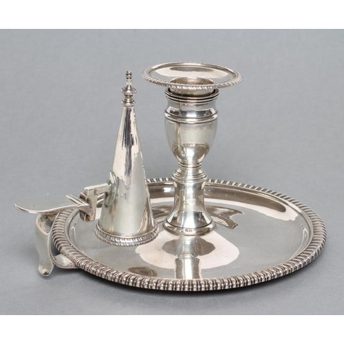 318 - A LATE GEORGE III SILVER CHAMBERSTICK, maker probably John Moore, London 1817, the dished circular b... 