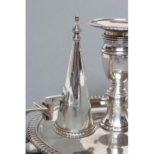 318 - A LATE GEORGE III SILVER CHAMBERSTICK, maker probably John Moore, London 1817, the dished circular b... 