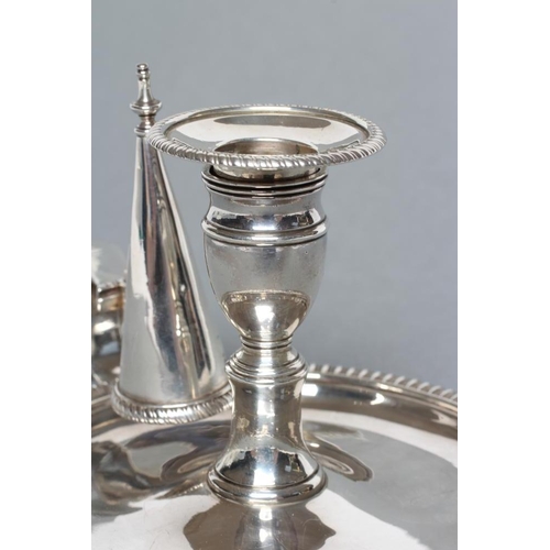 318 - A LATE GEORGE III SILVER CHAMBERSTICK, maker probably John Moore, London 1817, the dished circular b... 