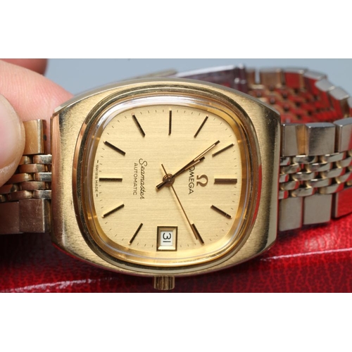 389 - A GENTLEMAN'S OMEGA SEAMASTER AUTOMATIC WRISTWATCH, the rounded square gilt dial with centre seconds... 