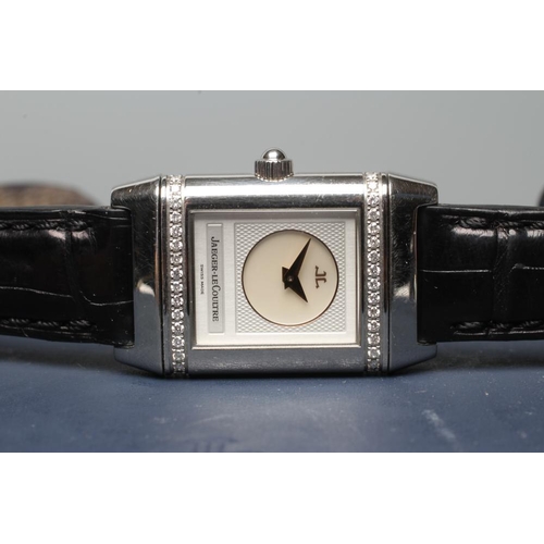 401 - A LADY'S JAEGER-LECOULTRE DIAMOND REVERSO WRISTWATCH, one side with small mother of pearl circular d... 