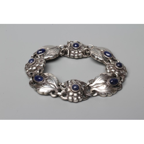 439 - A BRACELET to match the previous lot, collet set with cabochon polished blue hardstones, stamped and... 