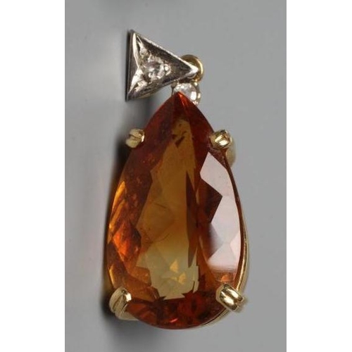 455 - A TOURMALINE PENDANT, the facet cut tear shaped stone claw set in a plain frame, the triangular bale... 