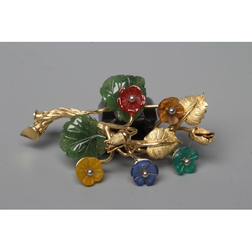 462 - A TUTTI-FRUTTI SPRAY BROOCH, stamped 585, with carved and polished semi precious flowerheads and lea... 