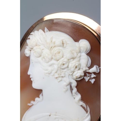 471 - A VICTORIAN SHELL CAMEO of oval form, carved with the head and shoulders portrait of a young lady we... 