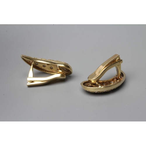 476 - A PAIR OF DIAMOND CLIP EARRINGS, the pointelle coma shaped panels pave set with scattered small ston... 