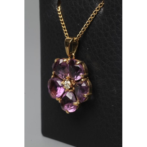 481 - AN AMETHYST FLOWER PENDANT, the five faceted heart shaped petals centred by a small round brilliant ... 