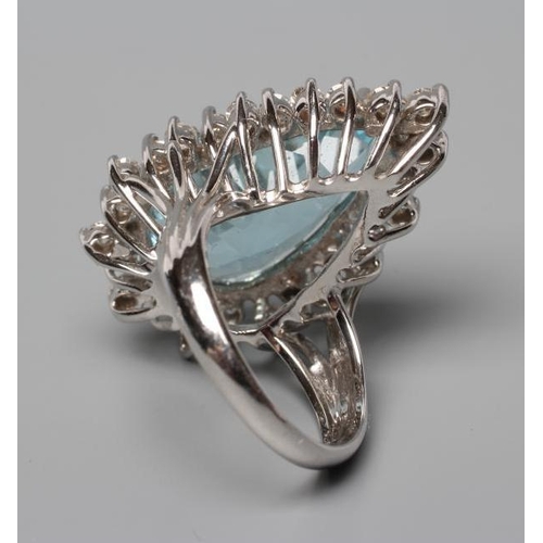 535 - AN AQUAMARINE AND DIAMOND COCKTAIL RING, the pear cut aquamarine of approximately 12.50cts, claw set... 