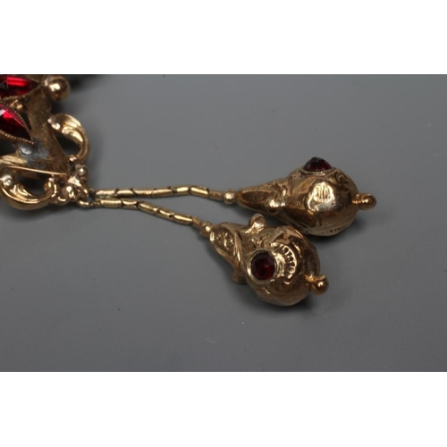 557 - A MID 19TH CENTURY GARNET AND SEED PEARL OPEN BROOCH similar to the previous lot, together with a si... 