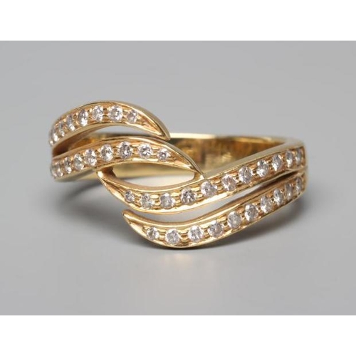 566 - A DIAMOND HALF HOOP DRESS RING, the four scroll panels all point set with small stones to a plain wi... 