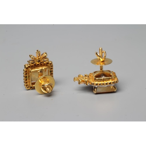 592 - A PAIR OF EDWARDIAN STYLE EAR STUDS, the oblong facet citrines claw set to a border of numerous smal... 