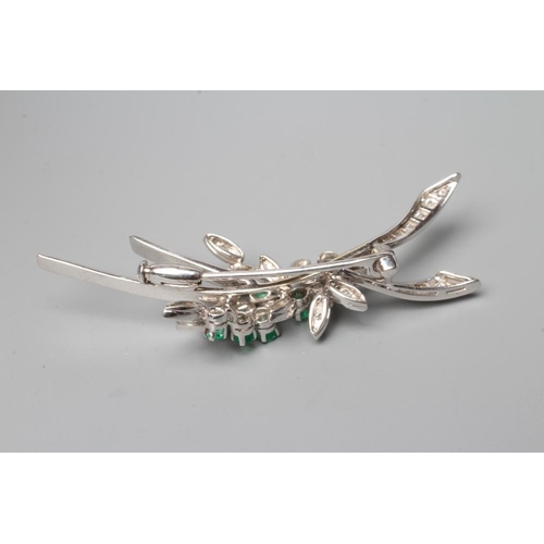 598 - AN EMERALD AND DIAMOND SPRAY BROOCH claw set with five small emeralds and numerous graduated diamond... 