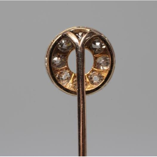 607 - A DIAMOND STICK PIN, the 