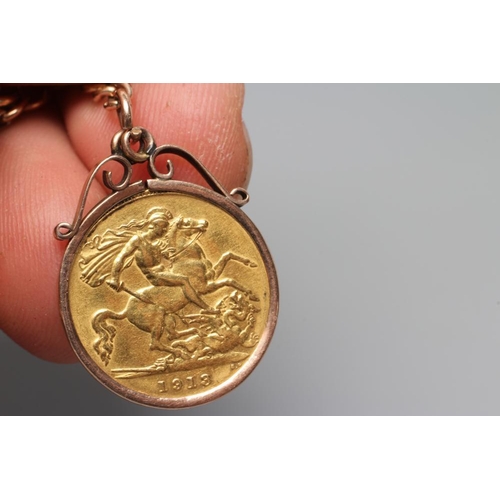 331 - A GEORGE V HALF SOVEREIGN, 1912, in a 9ct gold loose mount and pendant from a graduated curb link al... 