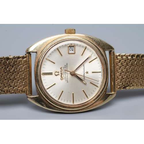 404 - A GENTLEMAN'S 9CT GOLD OMEGA AUTOMATIC CONSTELLATION CHRONOMETER, the silvered dial with applied met... 