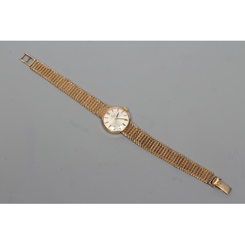 396 - A LADY'S 9CT GOLD OMEGA WRISTWATCH, the silvered dial with gilt metal batons, the seventeen jewel mo... 