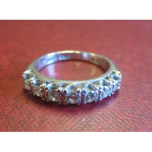 159 - 7 STONE DIAMOND 18CT WHITE GOLD HALF HOOP RING