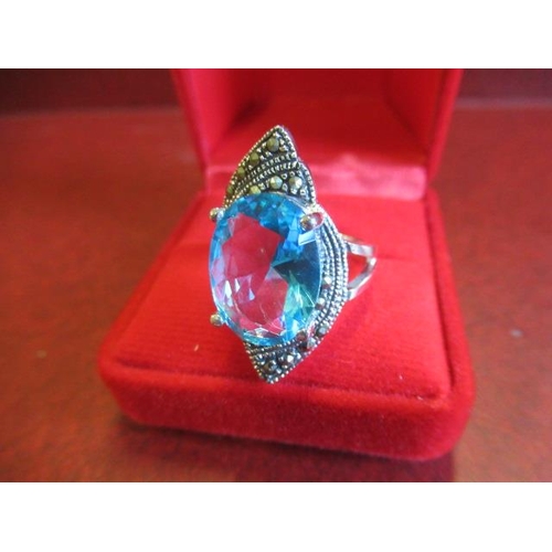 173 - SILVER BLUE TOPAZ AND MARCASITE RING