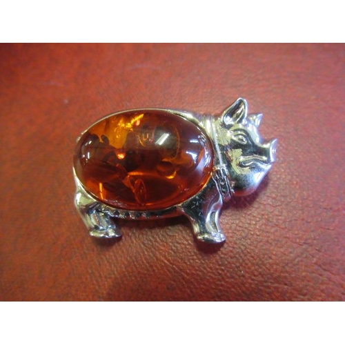 175 - SILVER AND AMBER PIG BROOCH