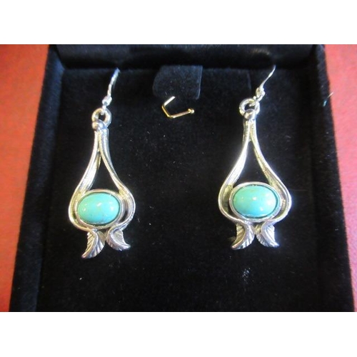 176 - PAIR OF SILVER AND TURQUOISE EARRINGS