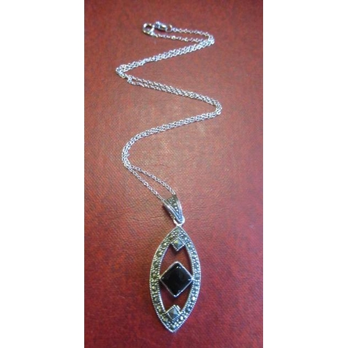 181 - SILVER JET AND MARCASITE PENDANT ON SILVER CHAIN