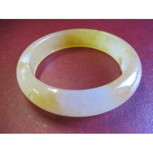 193 - CIRCLE OF HEAVEN GOLDEN JADE BANGLE