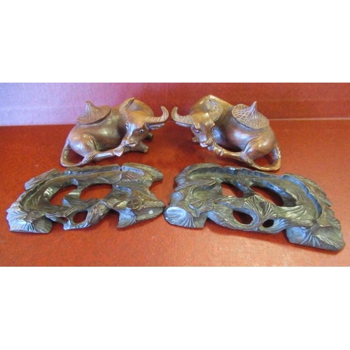 268 - PAIR OF CHINESE CARVED BUFFALOS ON STAND