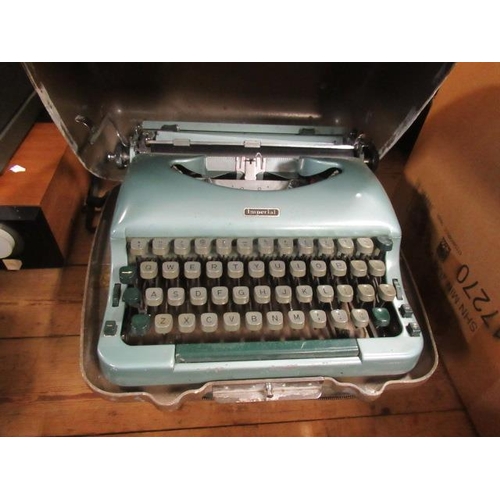 49 - TWO TYPEWRITERS