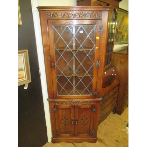 843 - CARVED OAK CORNER CUPBOARD