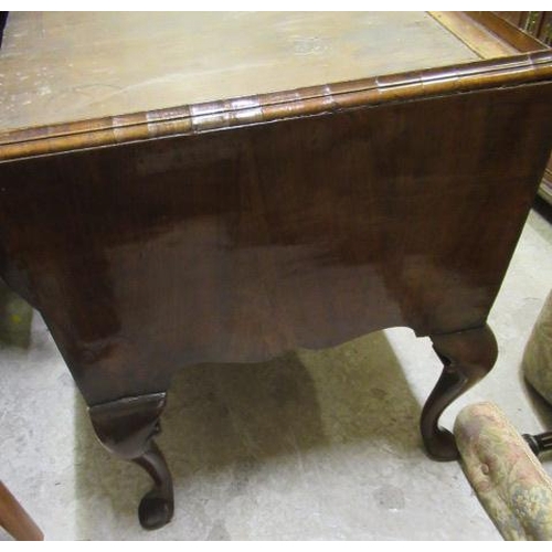 921 - A GEORGIAN WALNUT CHEST ON STAND, mid 18th century, crossbanded with feather stringing, the cavetto ... 