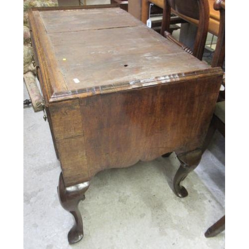 921 - A GEORGIAN WALNUT CHEST ON STAND, mid 18th century, crossbanded with feather stringing, the cavetto ... 