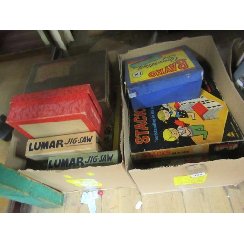 151 - TWO BOXES OF JIGSAWS AND BOARD GAMES