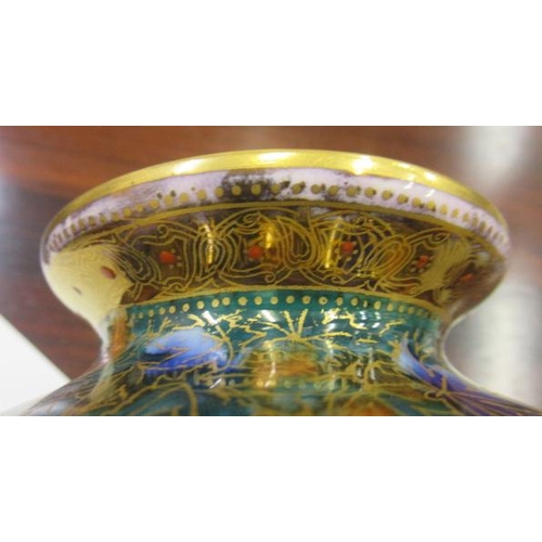 56 - A WEDGWOOD FAIRYLAND LUSTRE VASE, 1930's, of inverted baluster form, printed in gilt and painted in ... 