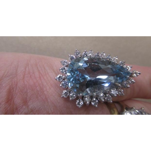 535 - AN AQUAMARINE AND DIAMOND COCKTAIL RING, the pear cut aquamarine of approximately 12.50cts, claw set... 