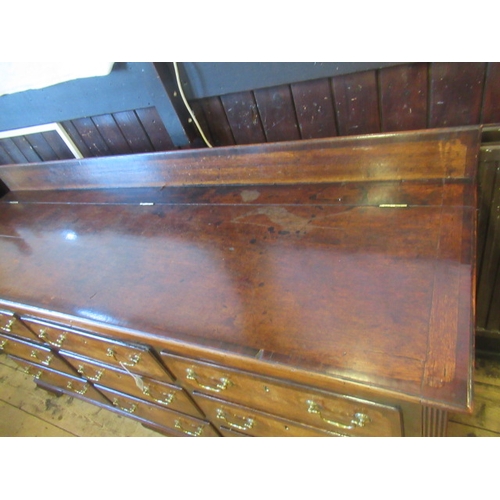 930 - A GEORGIAN OAK AND MAHOGANY BANDED LANCASHIRE DRESSER, second half 18th century, the top with ledge ... 