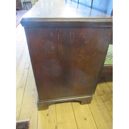 936 - A GEORGIAN OAK AND MAHOGANY BANDED ENCLOSED DRESSER, late 18th century, the moulded edged top over c... 