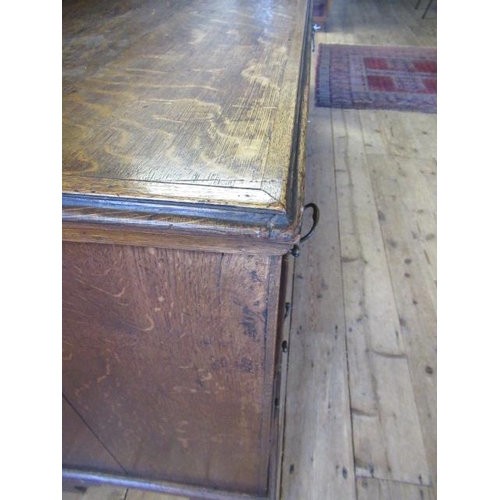 936 - A GEORGIAN OAK AND MAHOGANY BANDED ENCLOSED DRESSER, late 18th century, the moulded edged top over c... 