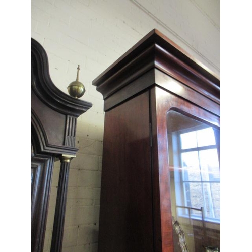 926 - A VICTORIAN MAHOGANY BREAKFRONT LIBRARY BOOKCASE, the moulded cornice over four arched glazed doors,... 