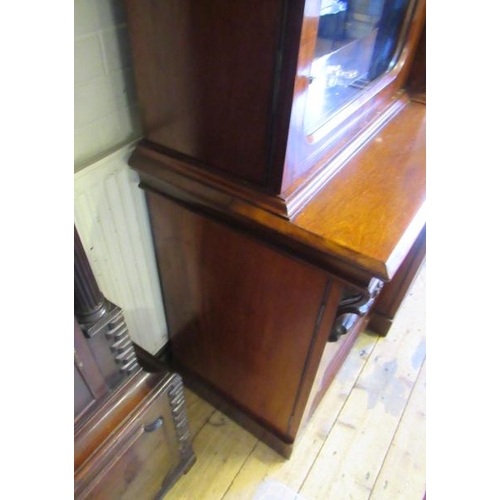 926 - A VICTORIAN MAHOGANY BREAKFRONT LIBRARY BOOKCASE, the moulded cornice over four arched glazed doors,... 