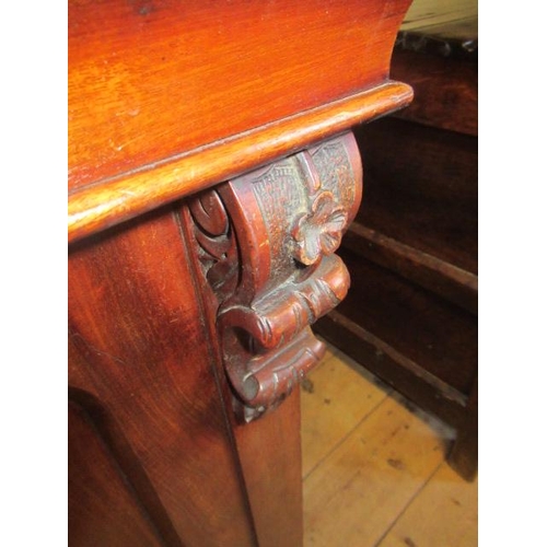 926 - A VICTORIAN MAHOGANY BREAKFRONT LIBRARY BOOKCASE, the moulded cornice over four arched glazed doors,... 