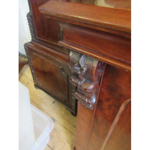 926 - A VICTORIAN MAHOGANY BREAKFRONT LIBRARY BOOKCASE, the moulded cornice over four arched glazed doors,... 