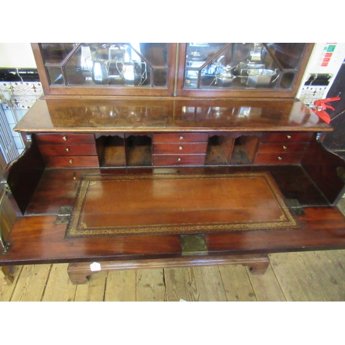 929 - A GEORGIAN MAHOGANY SECRETAIRE BOOKCASE, third quarter 18th century, the dentil moulded cornice over... 