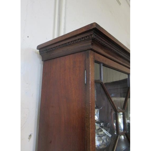 929 - A GEORGIAN MAHOGANY SECRETAIRE BOOKCASE, third quarter 18th century, the dentil moulded cornice over... 