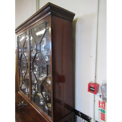 929 - A GEORGIAN MAHOGANY SECRETAIRE BOOKCASE, third quarter 18th century, the dentil moulded cornice over... 