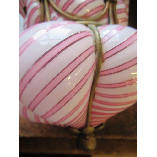 666 - A VICTORIAN HANGING LANTERN, the wirework frame with a custom blown pink and white candy stripe shad... 