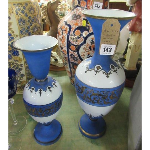 143 - TWO BLUE AND WHITE GLASS VASES