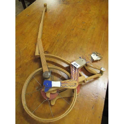 371 - UNICYCLE PUSH TOY